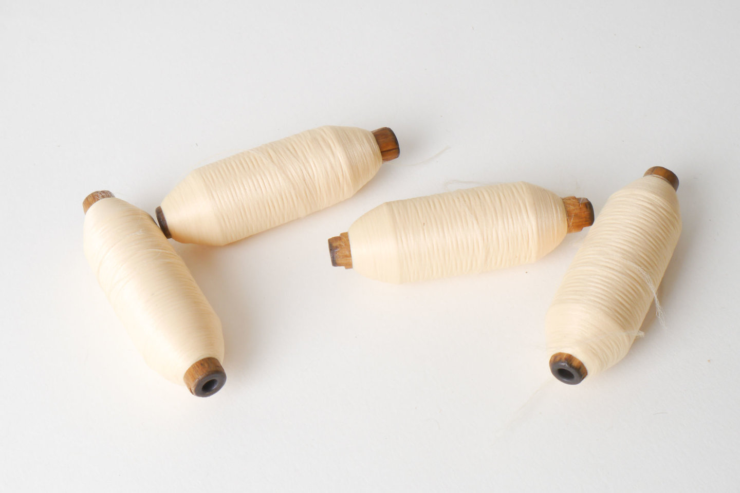 Spoel met inslaggaren voor passement