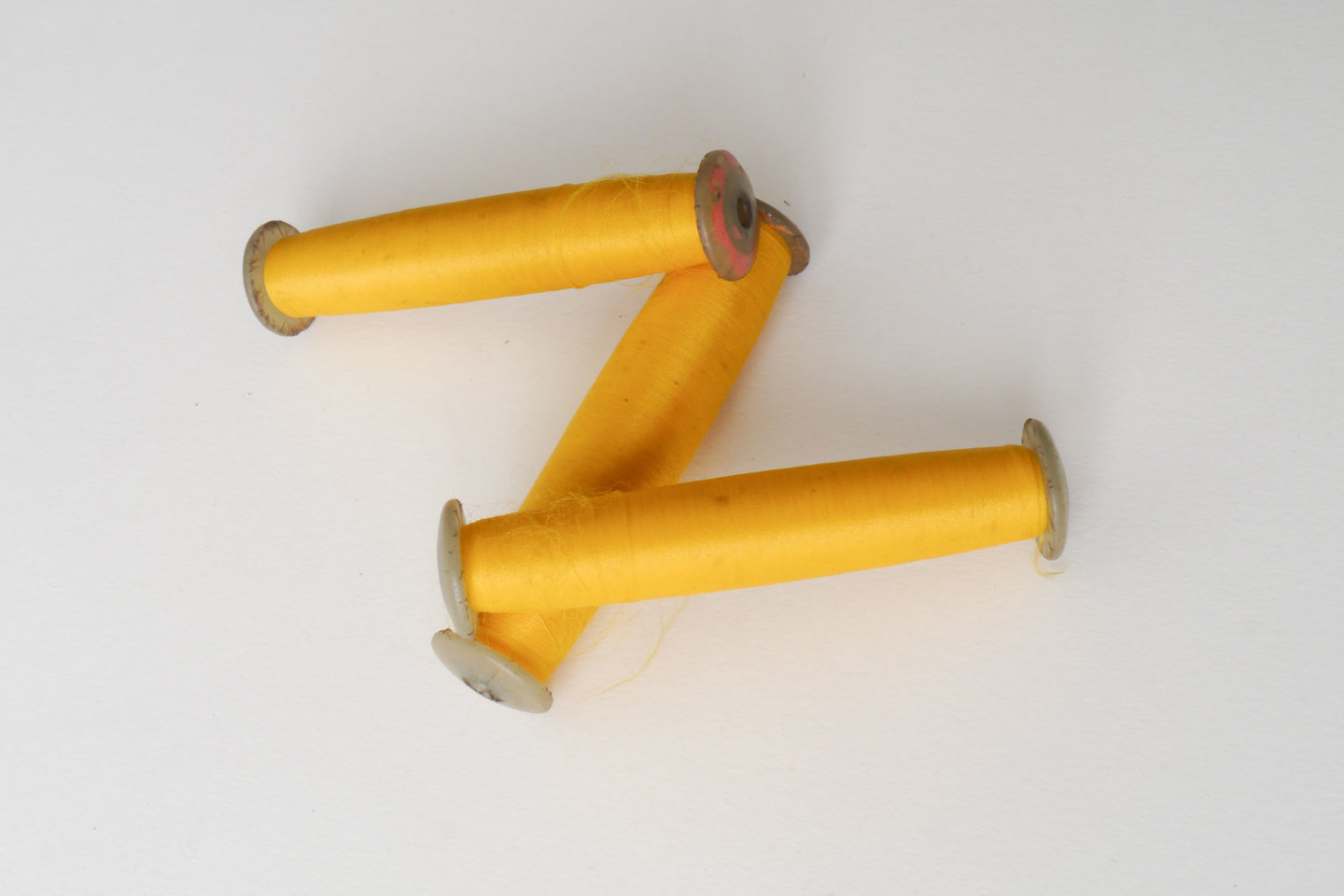 Spoel met inslaggaren voor passement