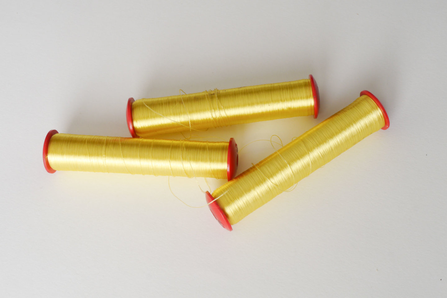 Spoel met inslaggaren voor passement