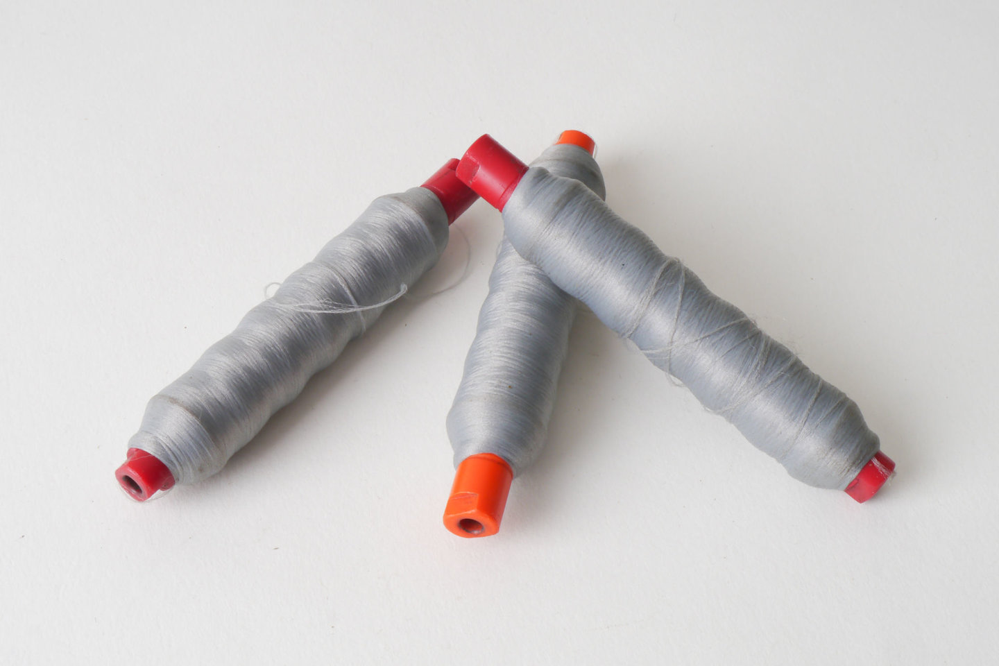 Spoel met inslaggaren voor passement