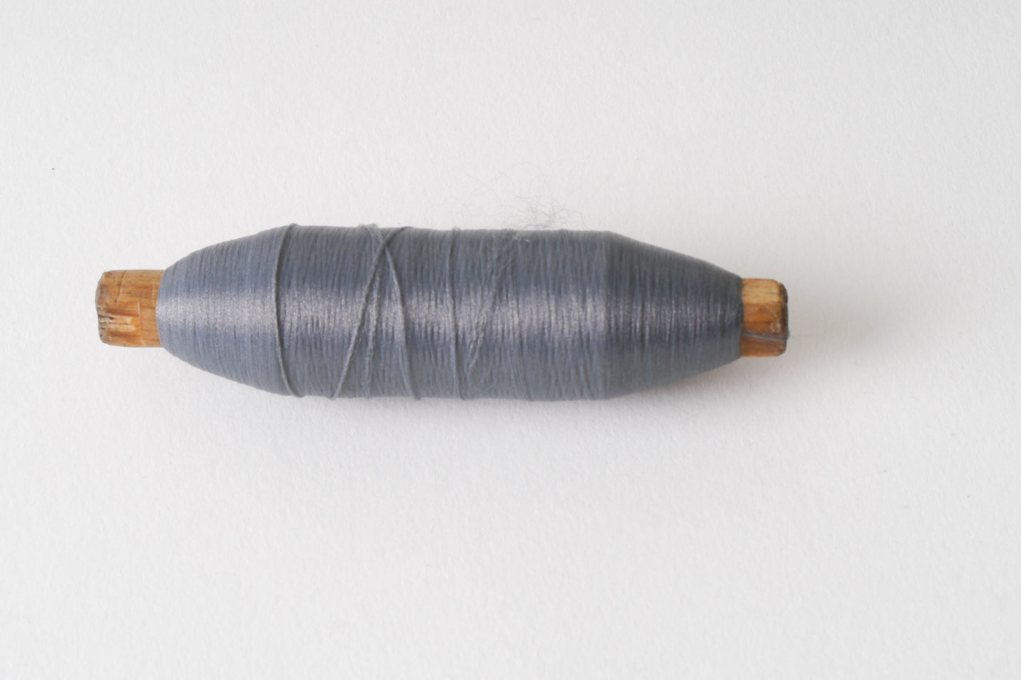 Spoel met inslaggaren voor passement