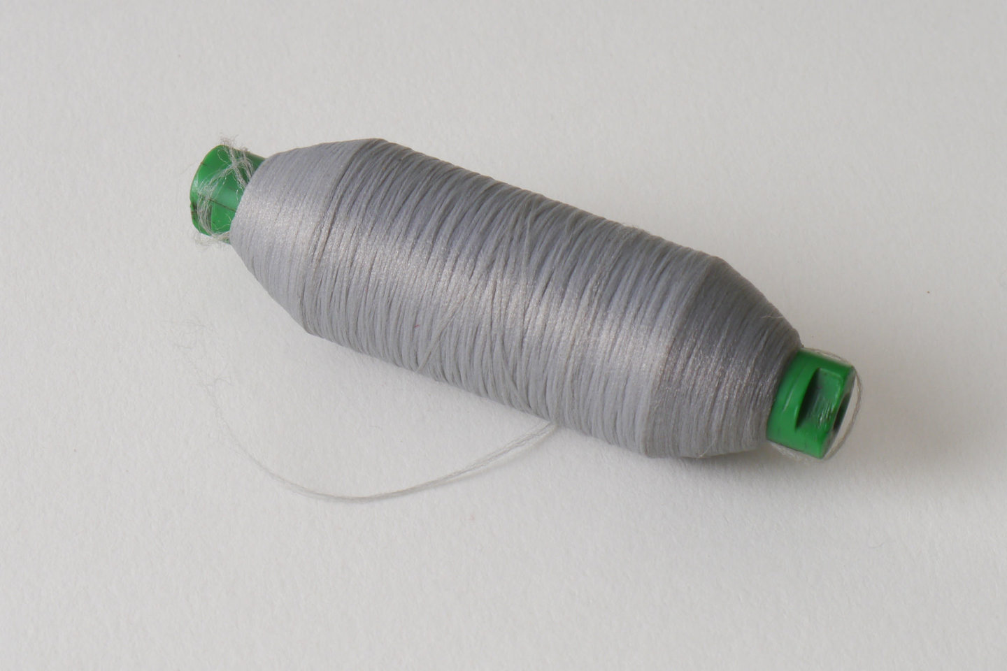 Spoel met inslaggaren voor passement