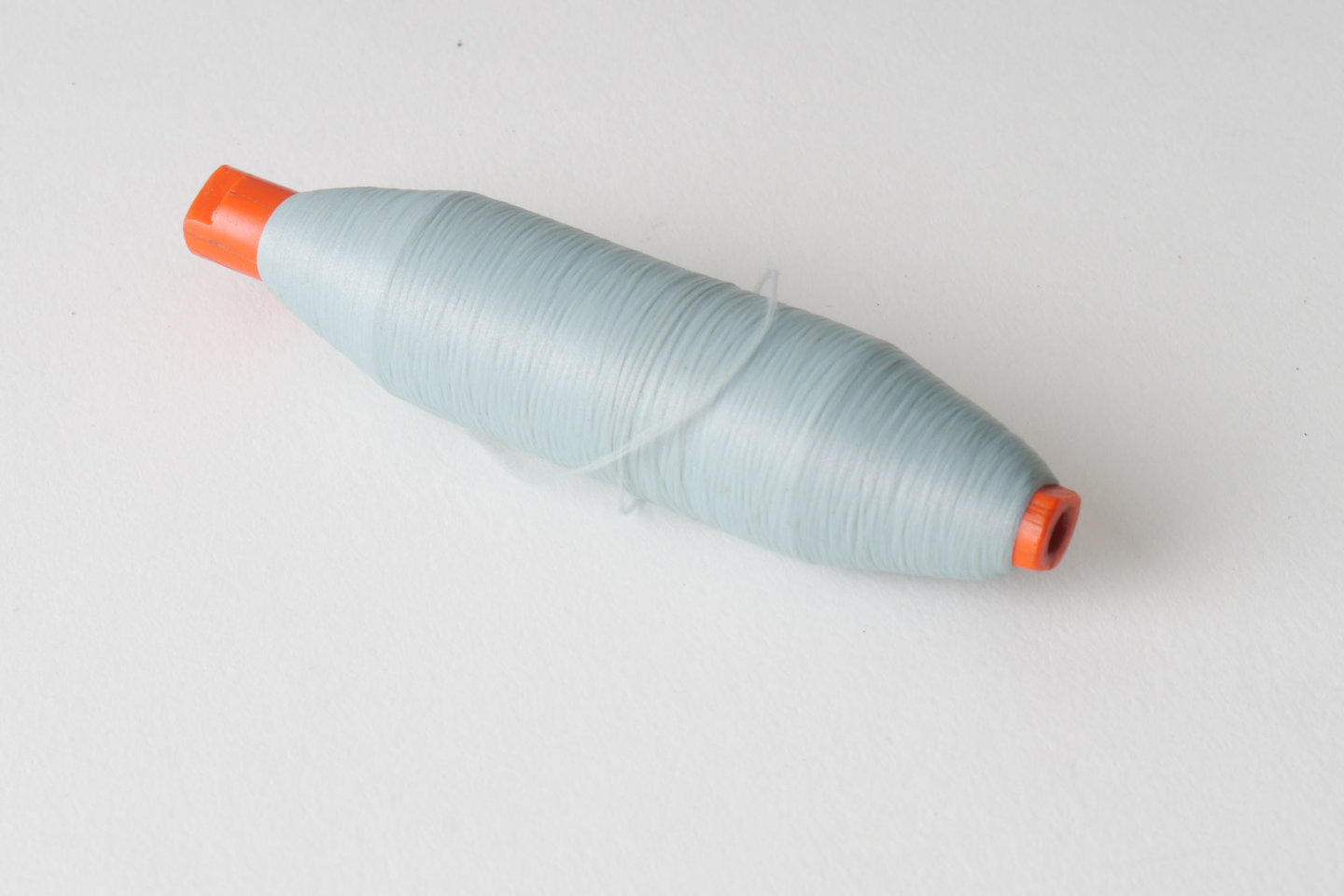 Spoel met inslaggaren voor passement