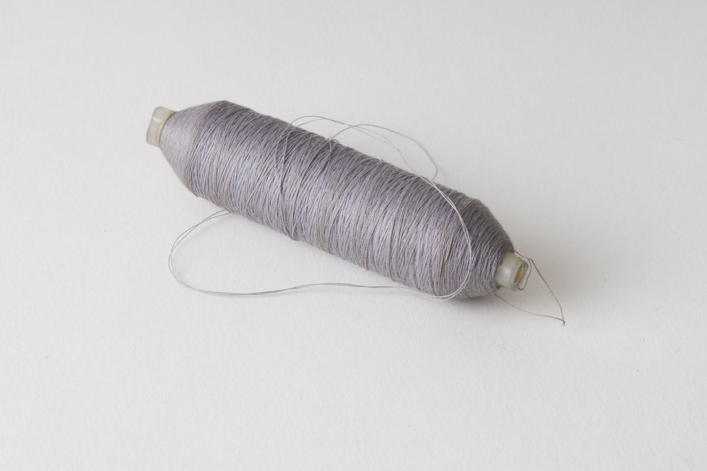 Spoel met inslaggaren voor passement