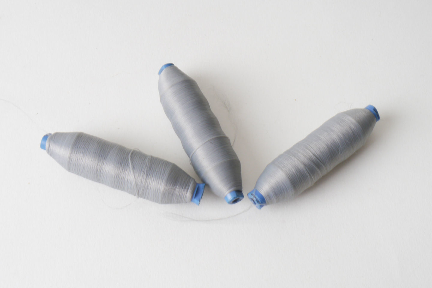 Spoel met inslaggaren voor passement