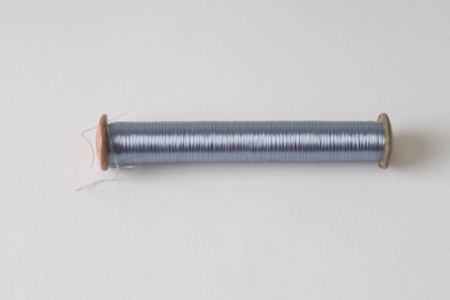 Spoel met inslaggaren voor passement