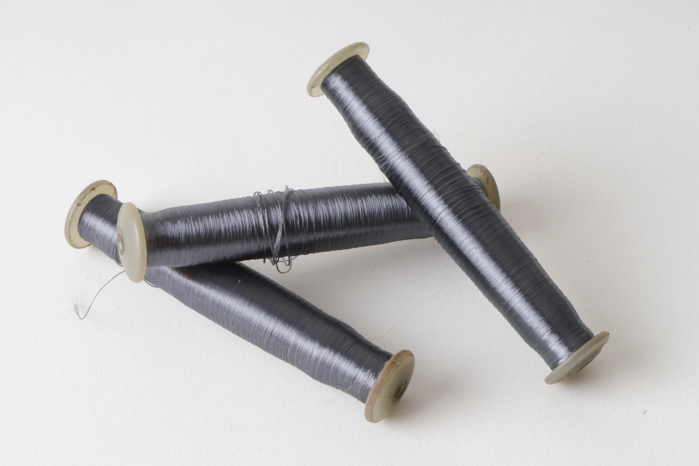 Spoel met inslaggaren voor passement