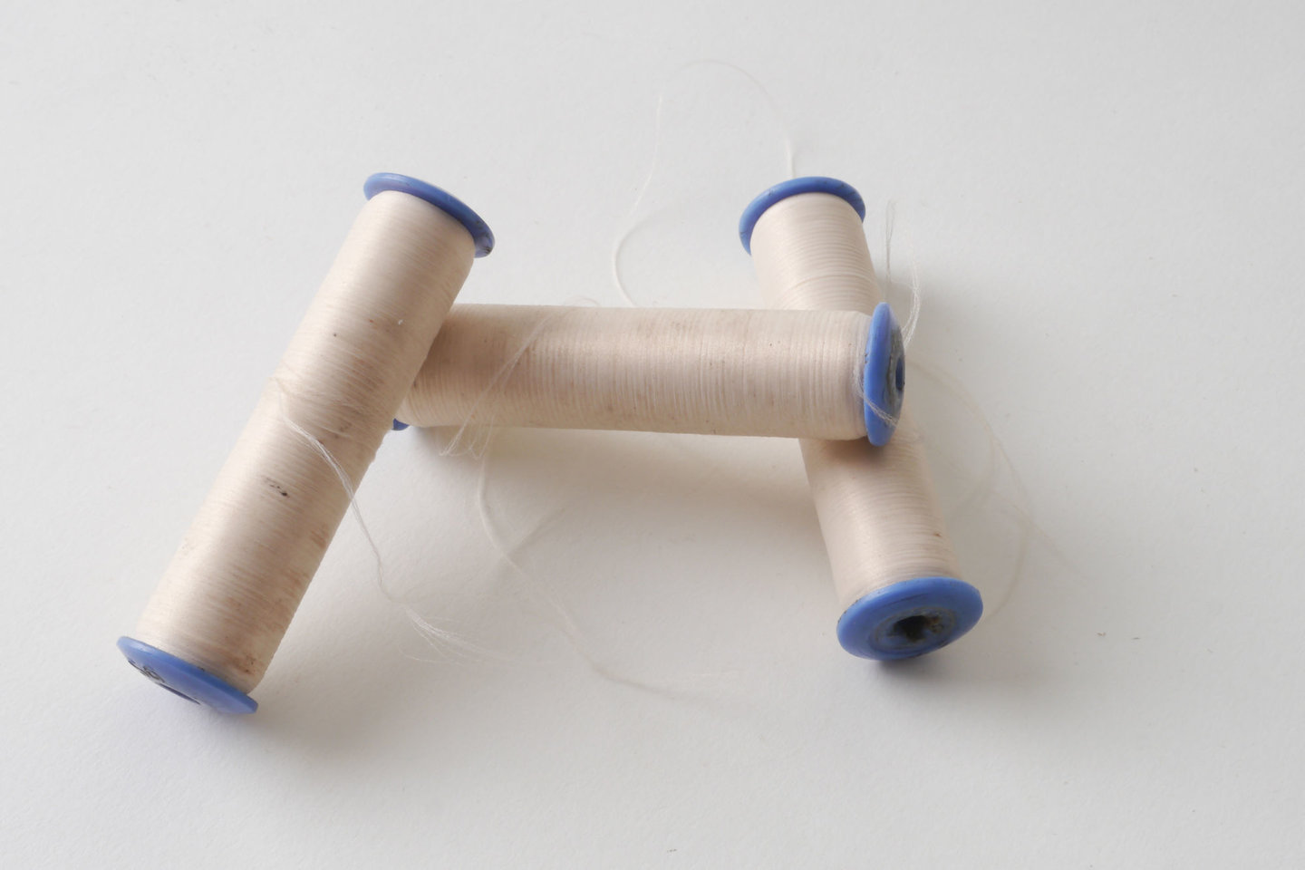 Spoel met inslaggaren voor passement