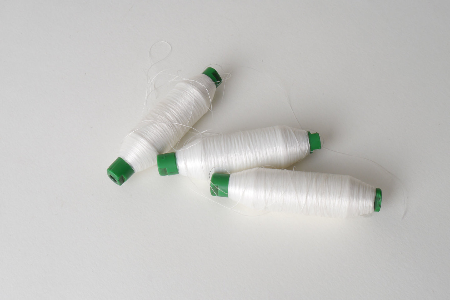 Spoel met inslaggaren voor passement