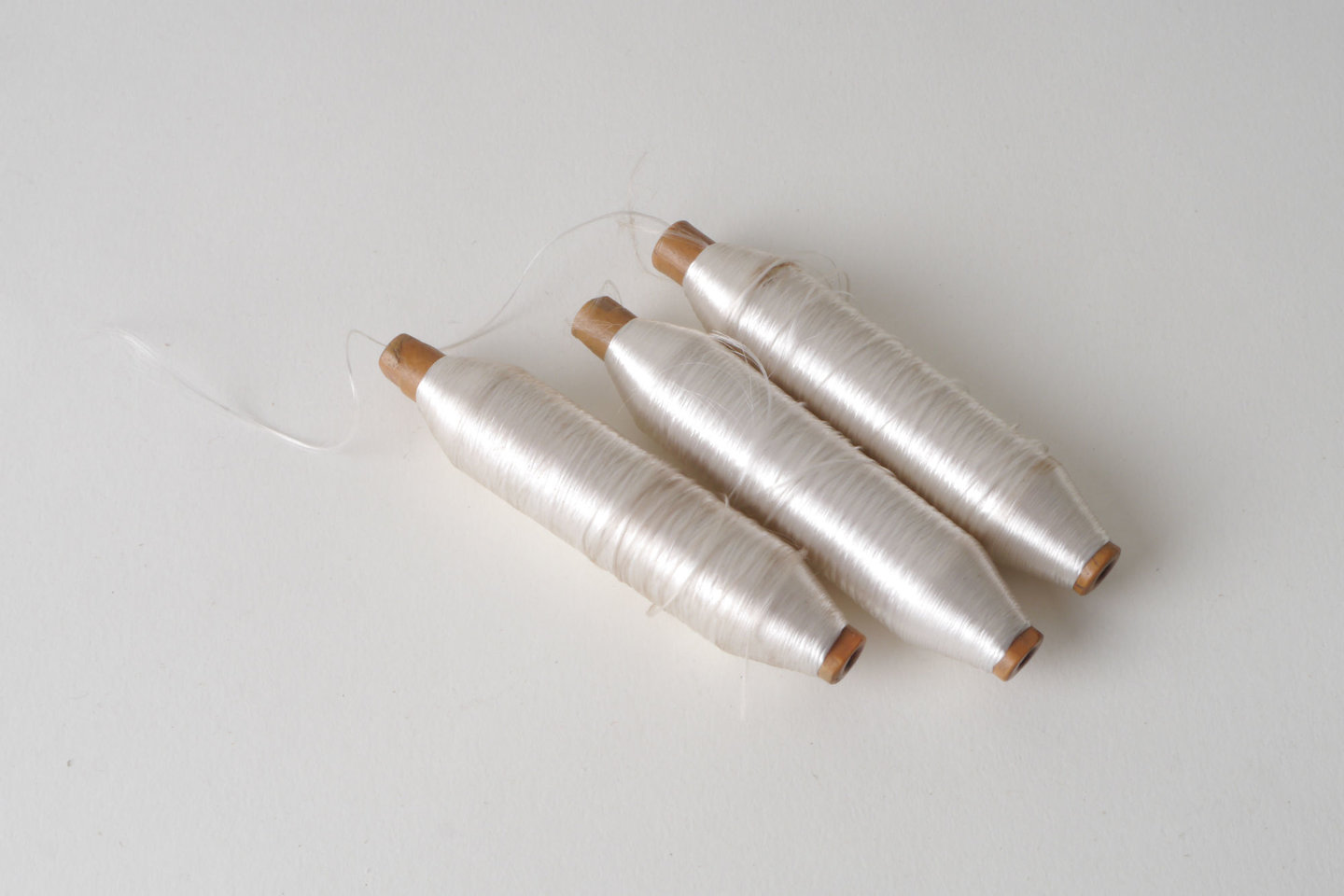 Spoel met inslaggaren voor passement