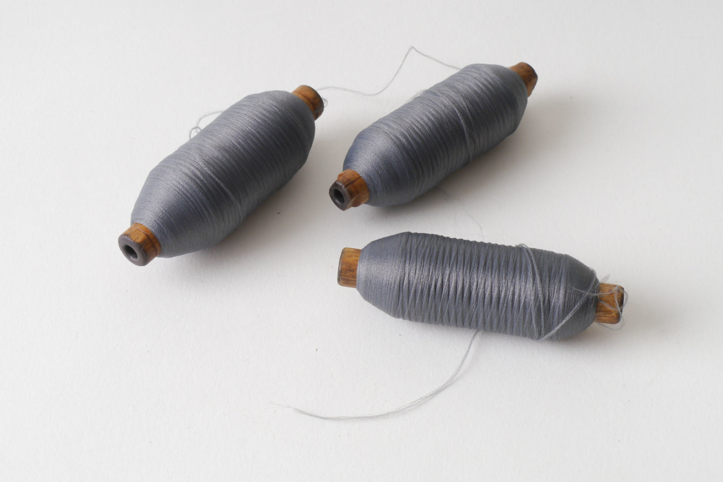 Spoel met inslaggaren voor passement