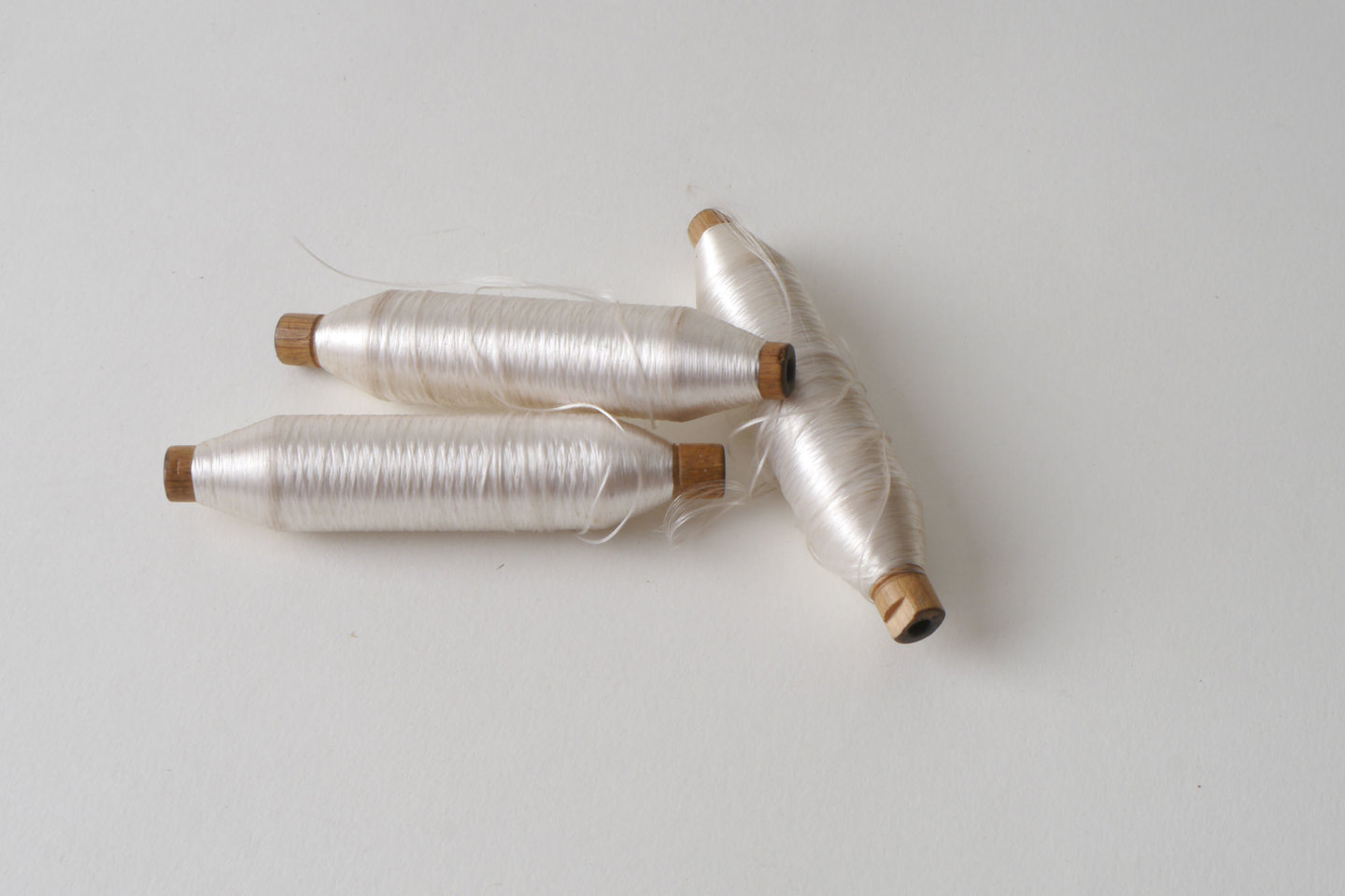 Spoel met inslaggaren voor passement