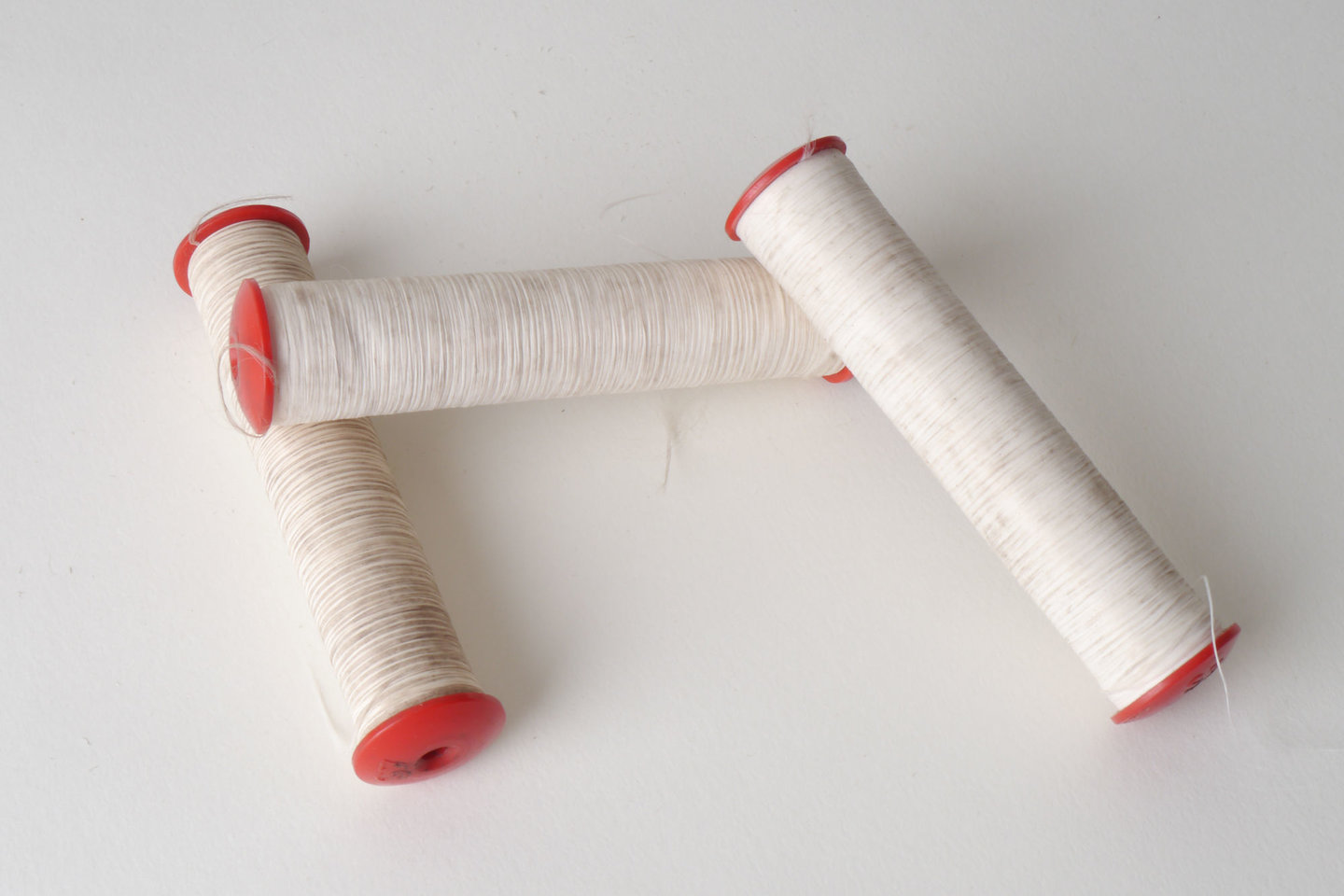 Spoel met inslaggaren voor passement