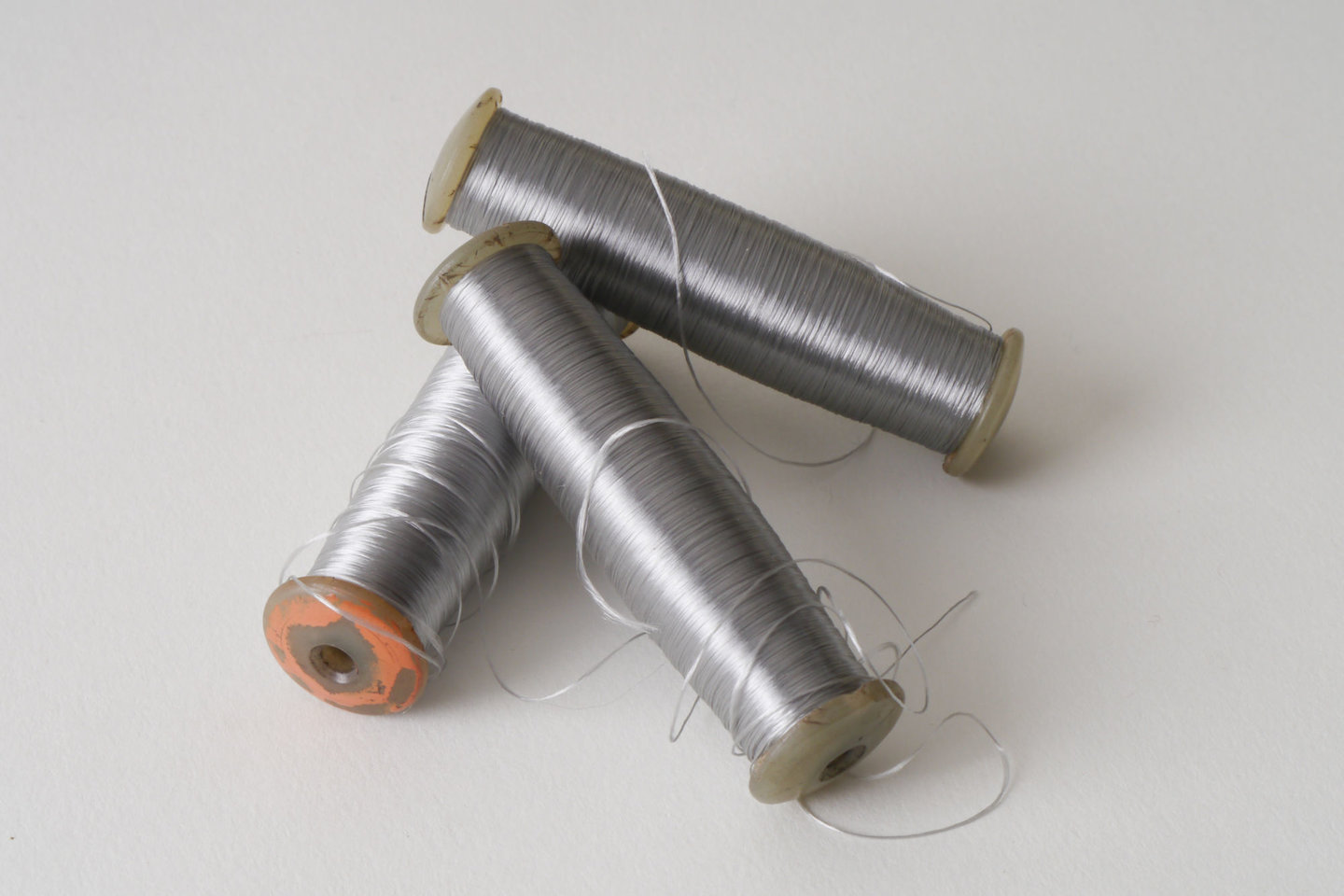 Spoel met inslaggaren voor passement