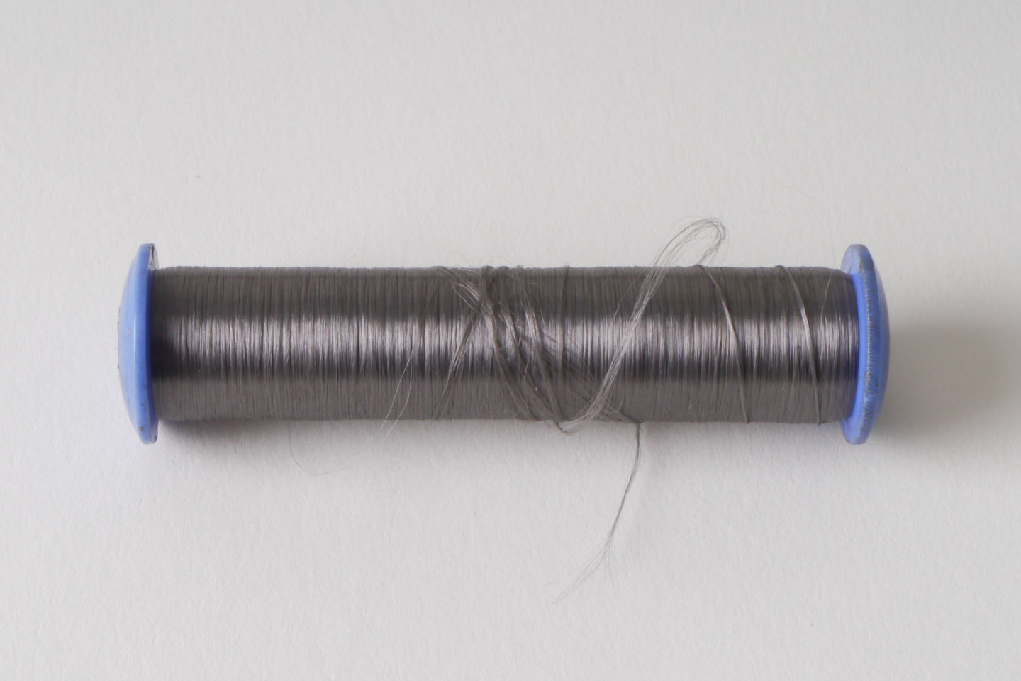 Spoel met inslaggaren voor passement