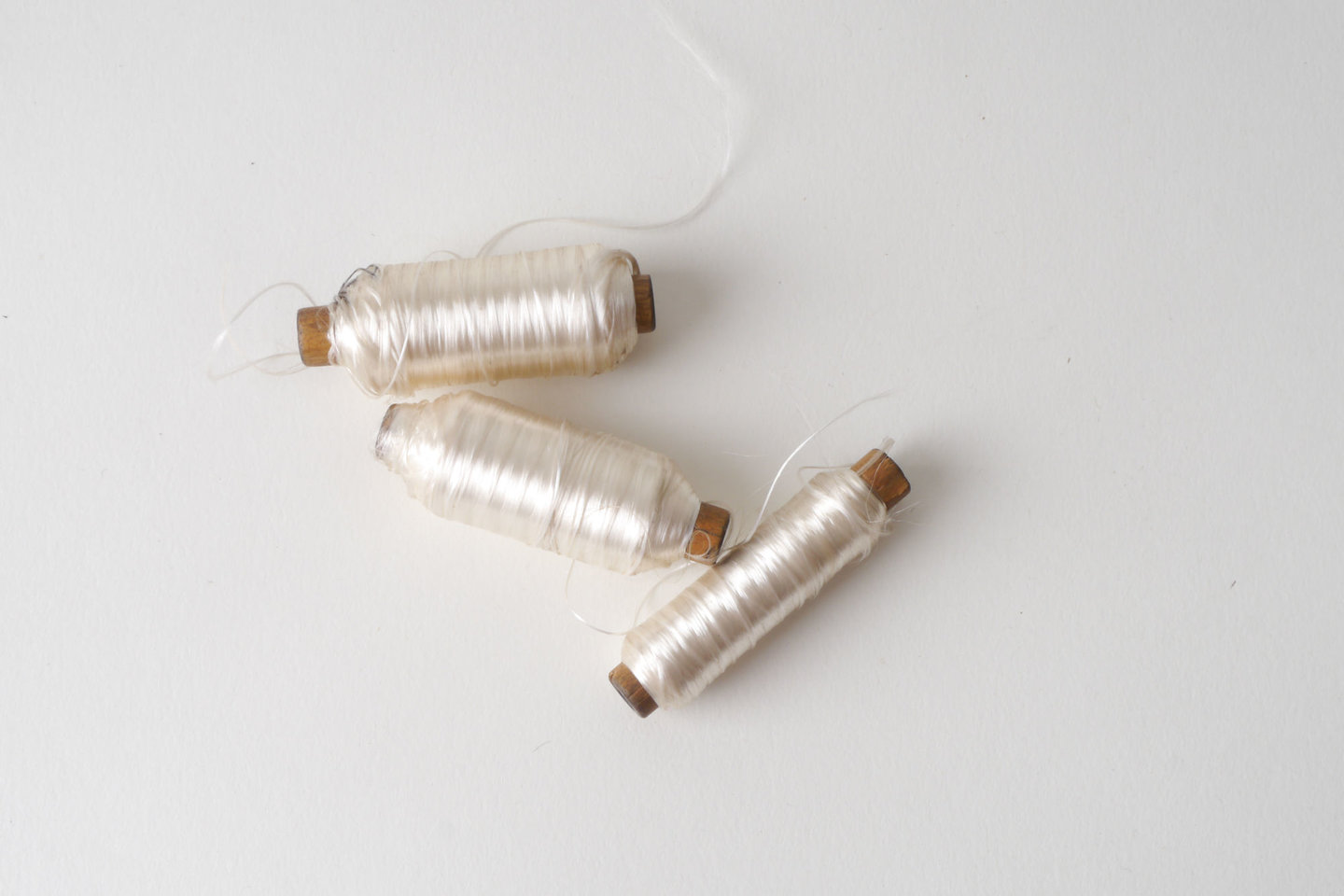 Spoel met inslaggaren voor passement