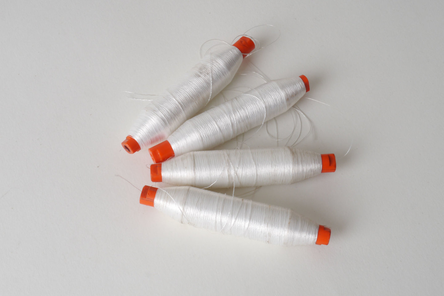 Spoel met inslaggaren voor passement