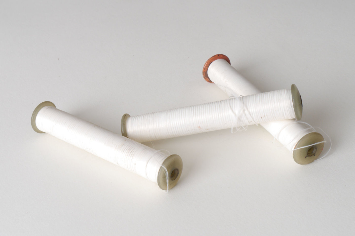 Spoel met inslaggaren voor passement