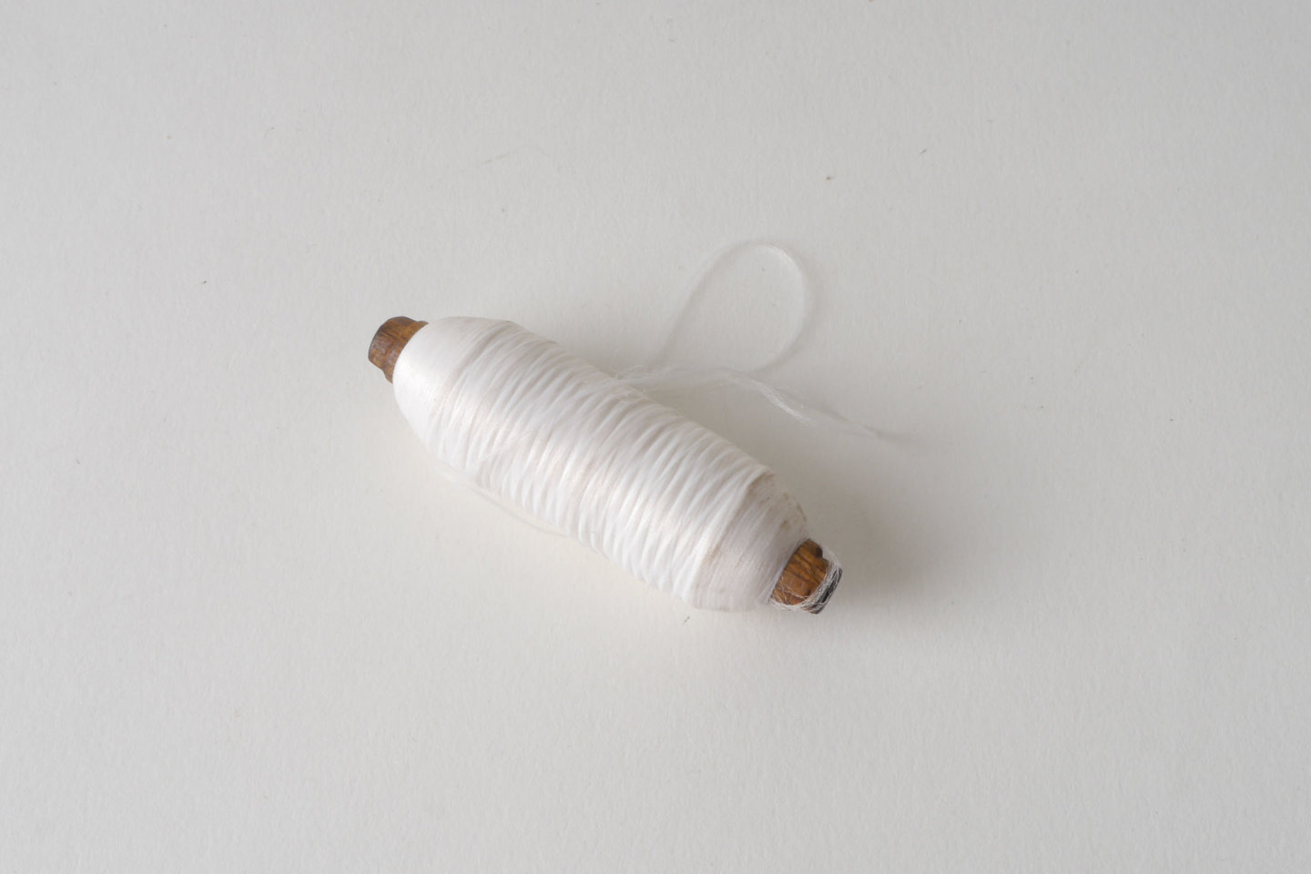 Spoel met inslaggaren voor passement