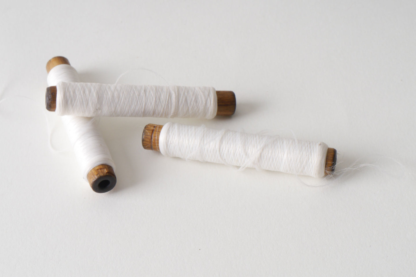 Spoel met inslaggaren voor passement