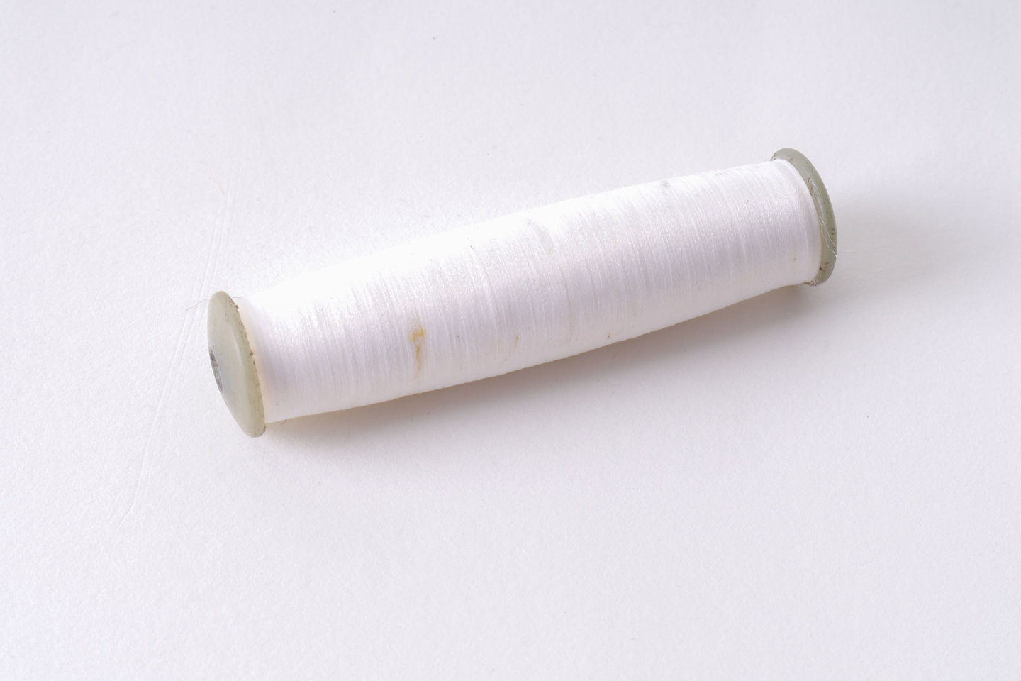 Spoel met inslaggaren voor passement