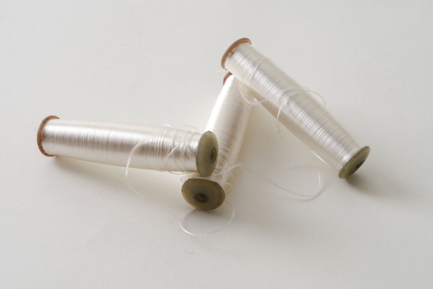 Spoel met inslaggaren voor passement