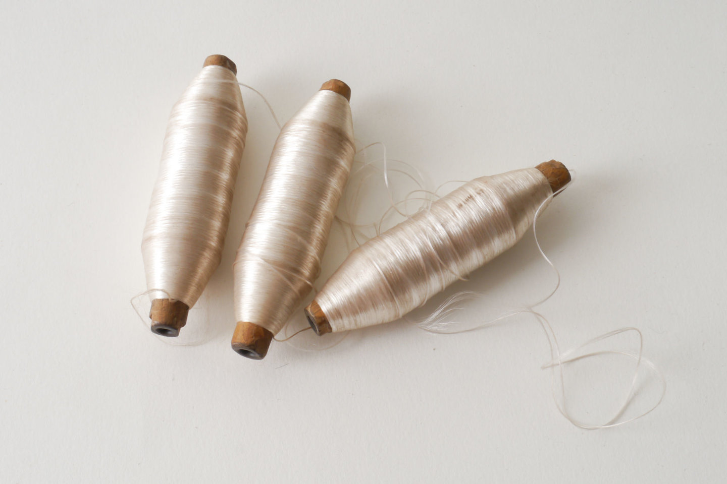 Spoel met inslaggaren voor passement