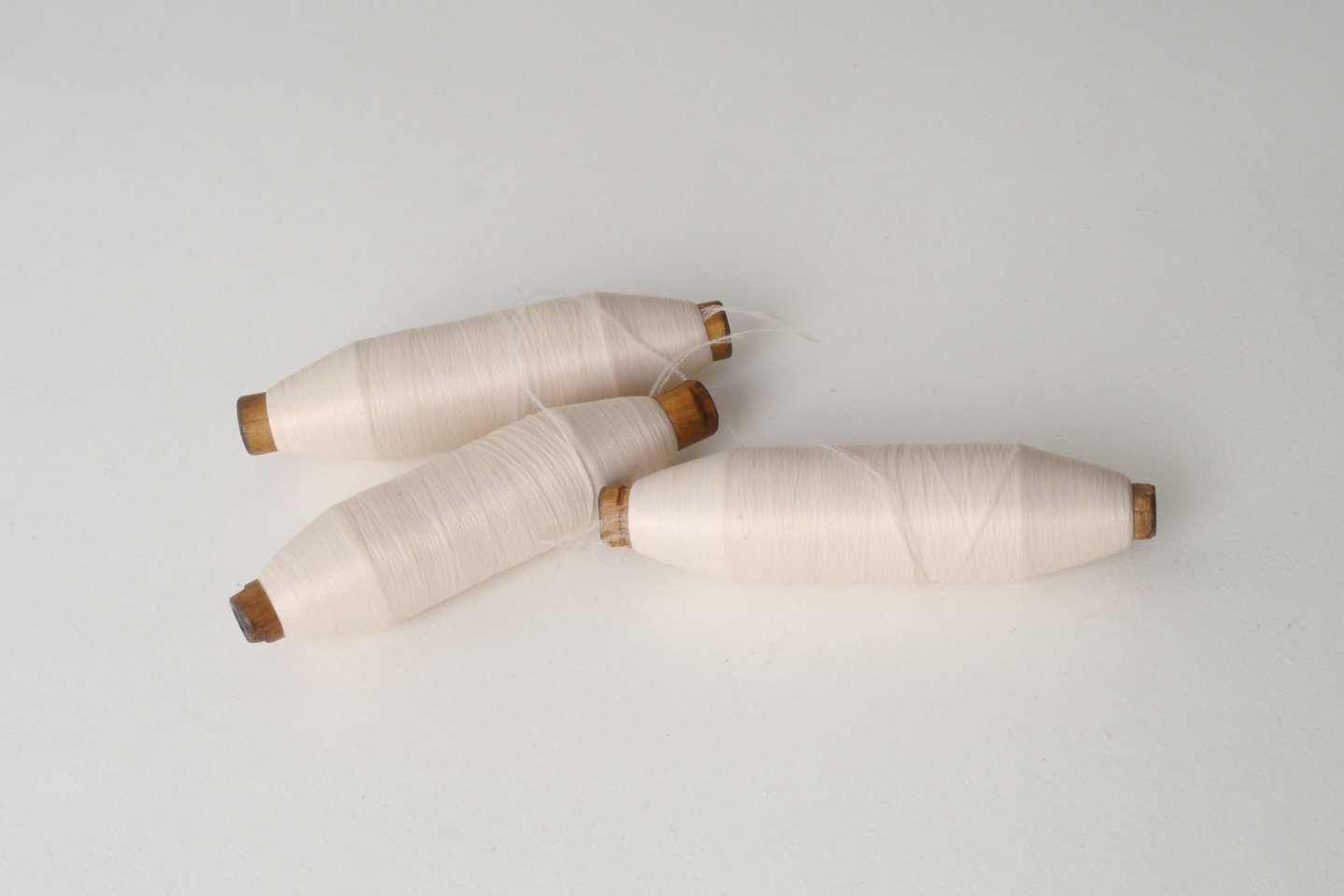 Spoel met inslaggaren voor passement