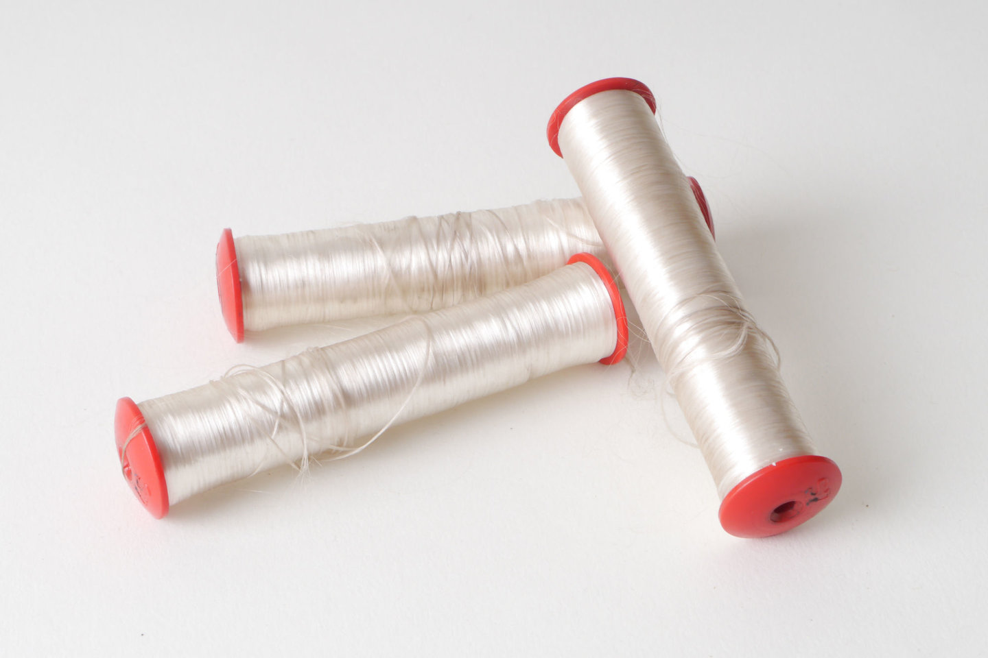 Spoel met inslaggaren voor passement