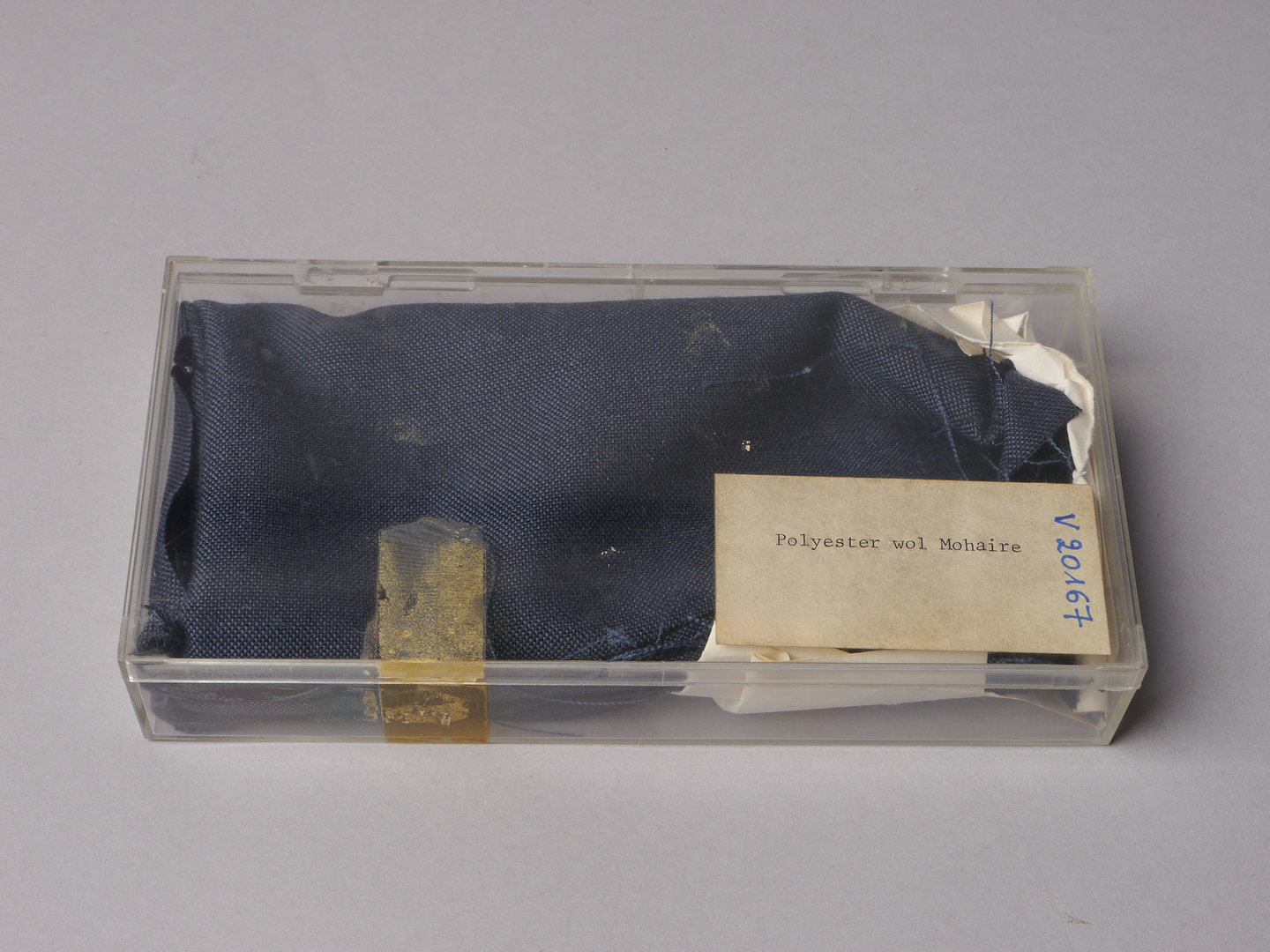 Staal van geweven textiel uit polyester en mohair wol