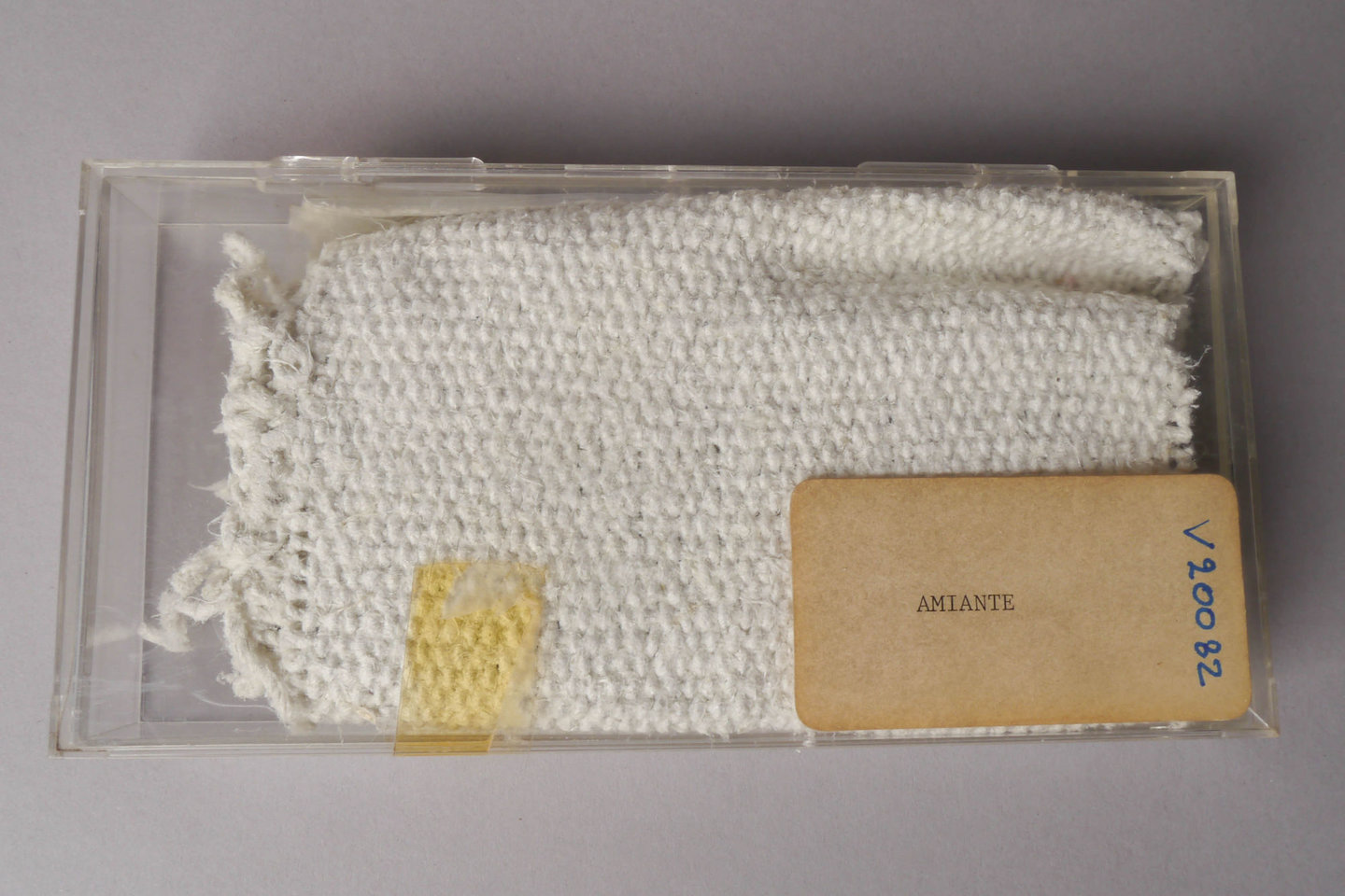 Staal van textiel in geweven asbest