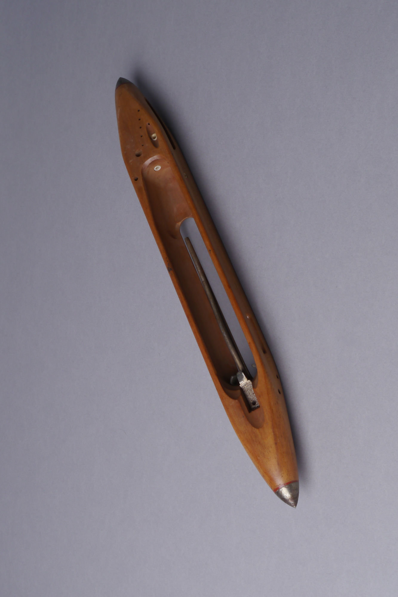 Schietspoel voor een halfautomatisch weefgetouw