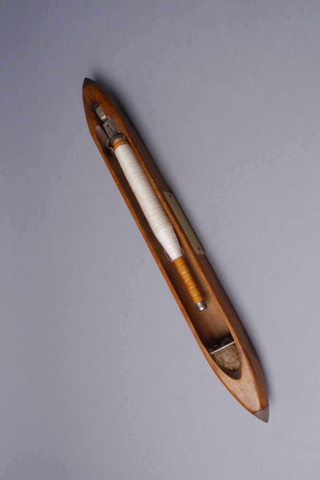 Schietspoel voor een halfautomatisch weefgetouw