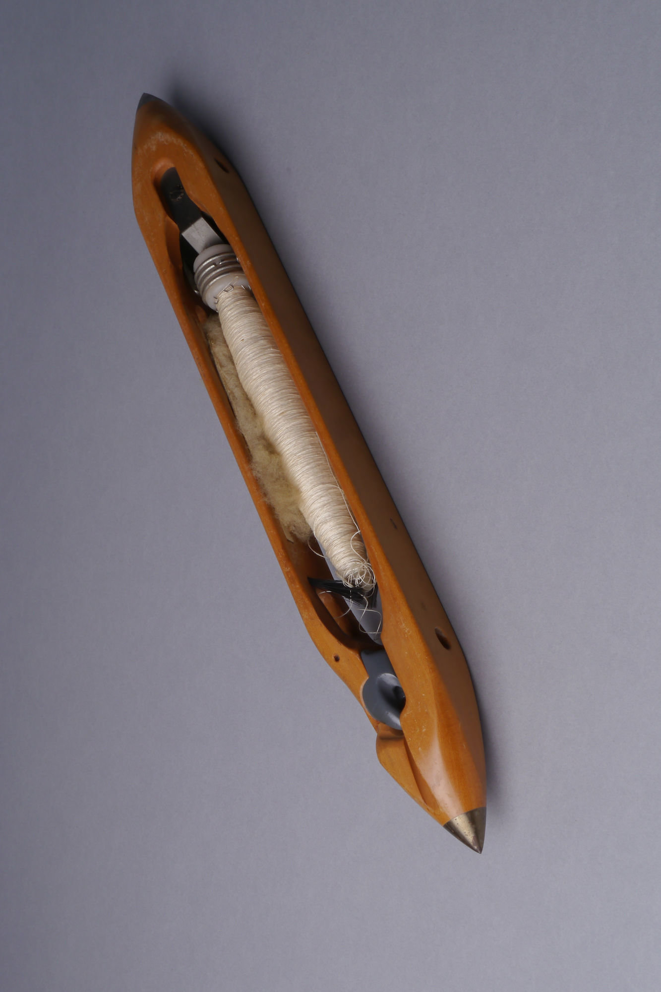 Schietspoel voor een volautomatisch weefgetouw van het merk Draper