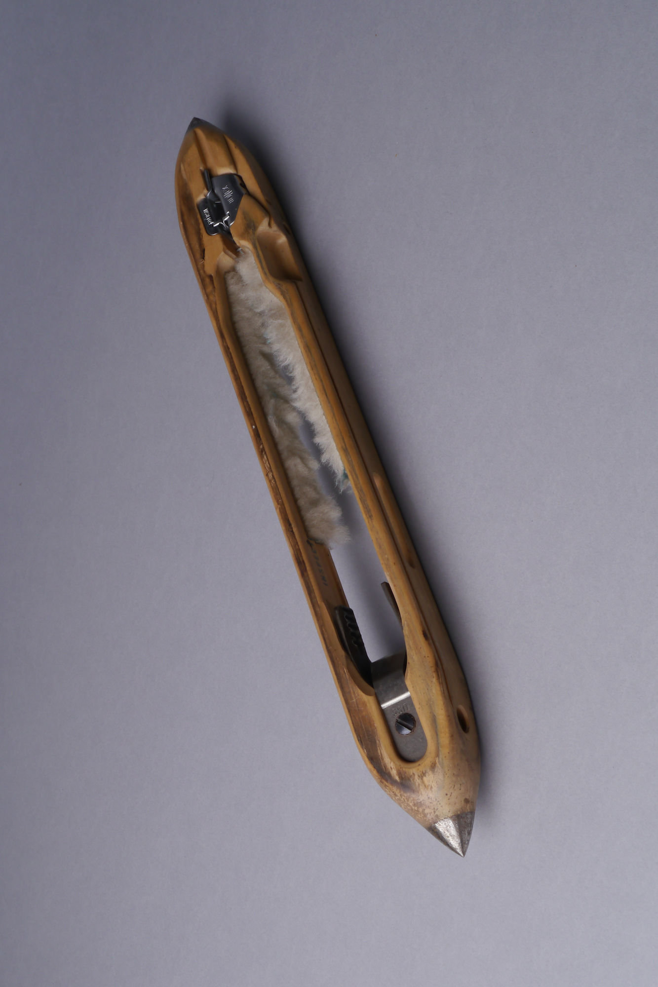 Schietspoel voor een volautomatisch weefgetouw van het merk Vermeulen