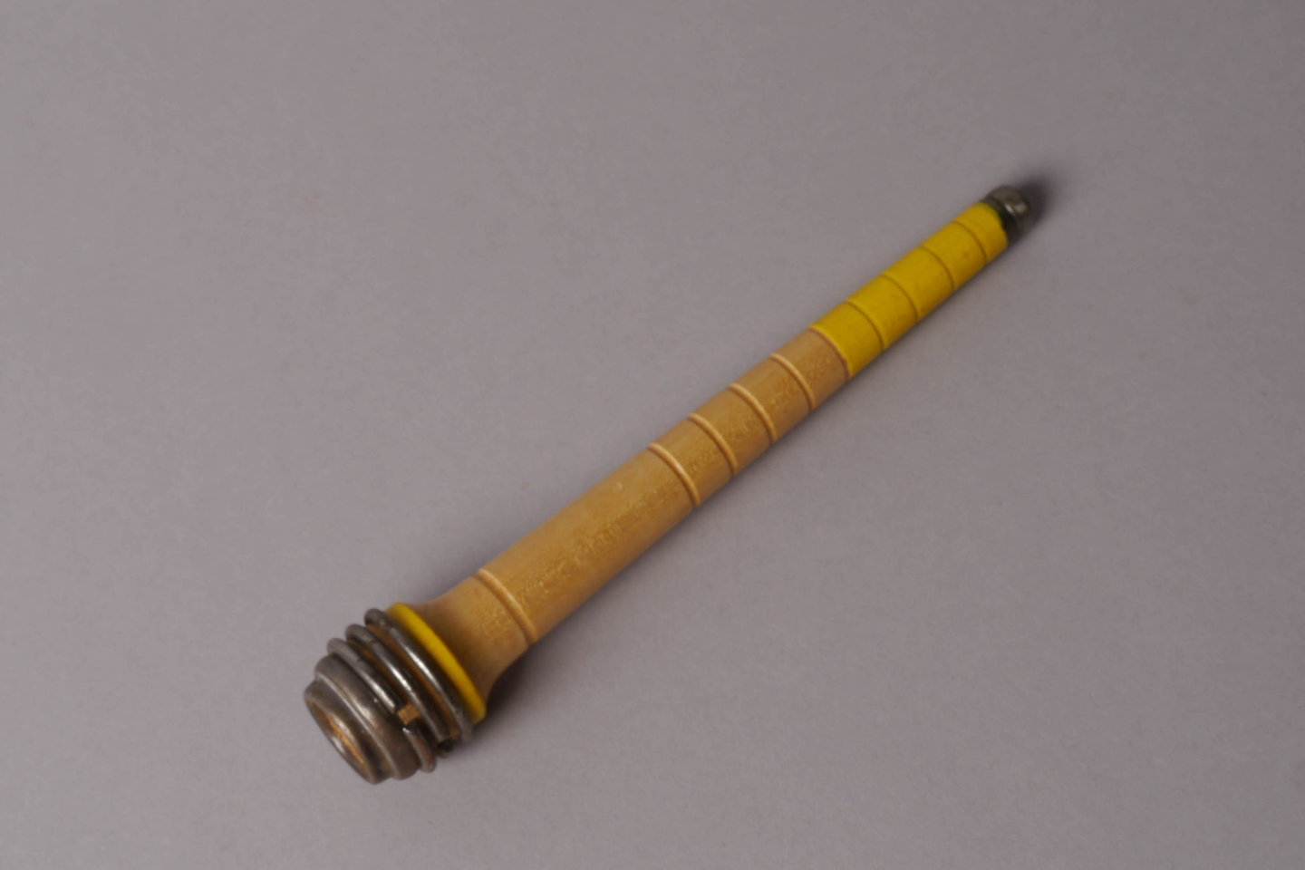 Inslagspoel voor een volautomatisch weefgetouw