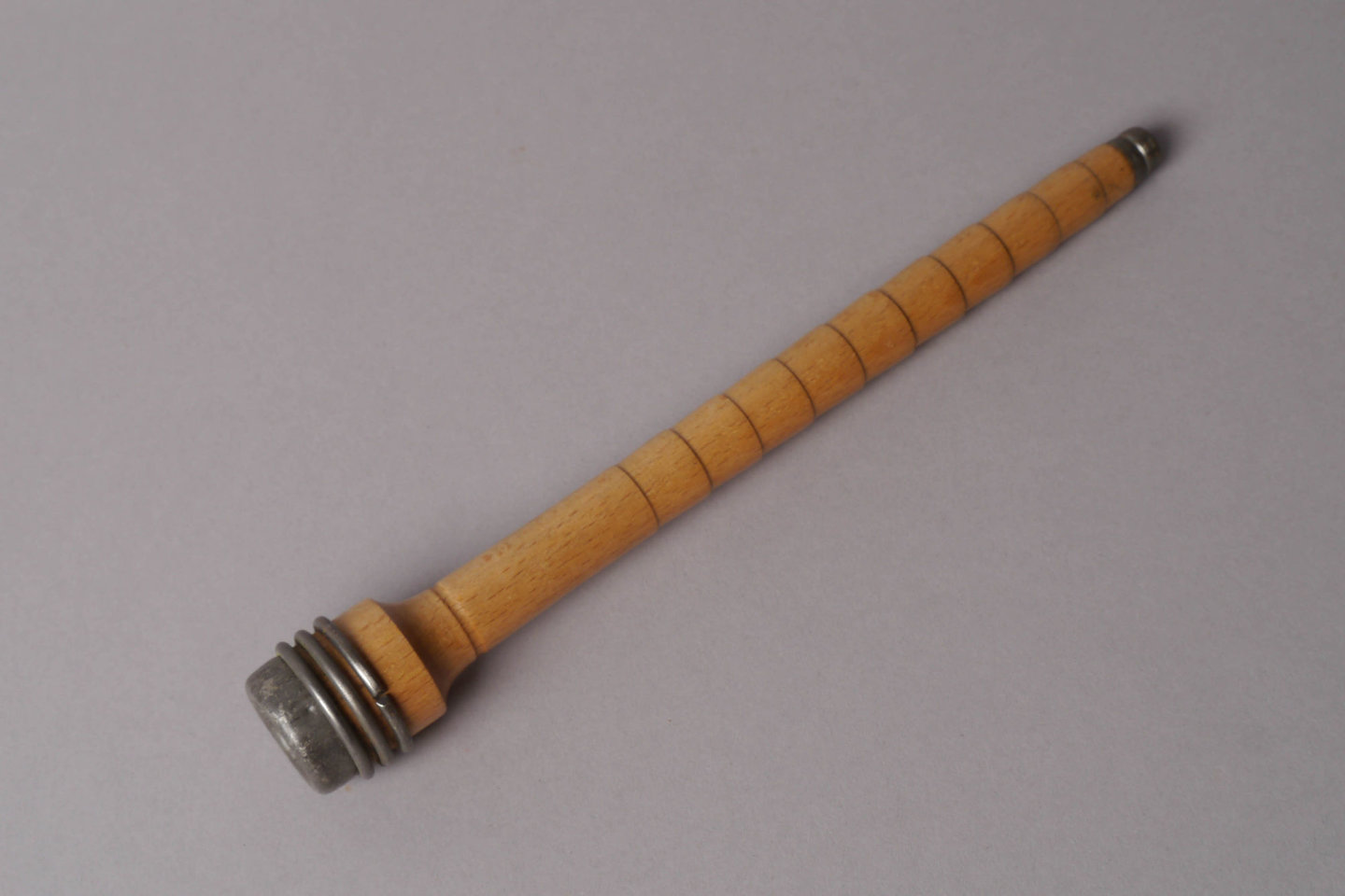 Inslagspoel voor een volautomatisch weefgetouw