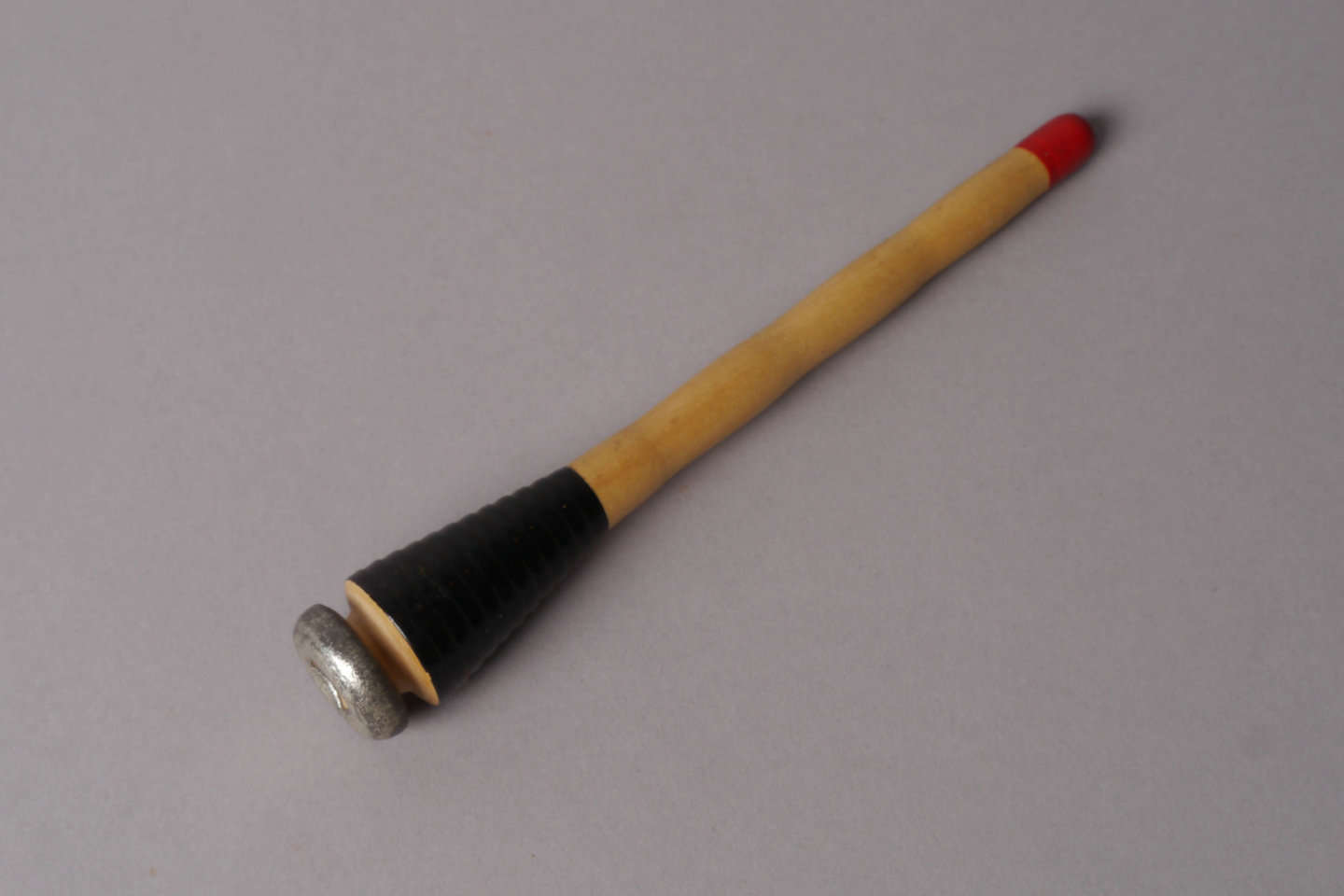 Inslagspoel voor een halfautomatisch weefgetouw