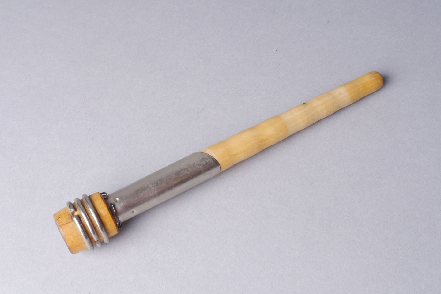 Inslagspoel voor een volautomatisch weefgetouw