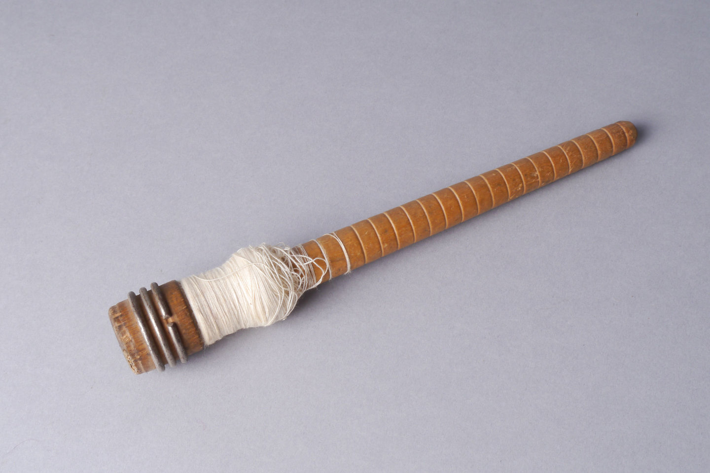 Inslagspoel voor een volautomatisch weefgetouw