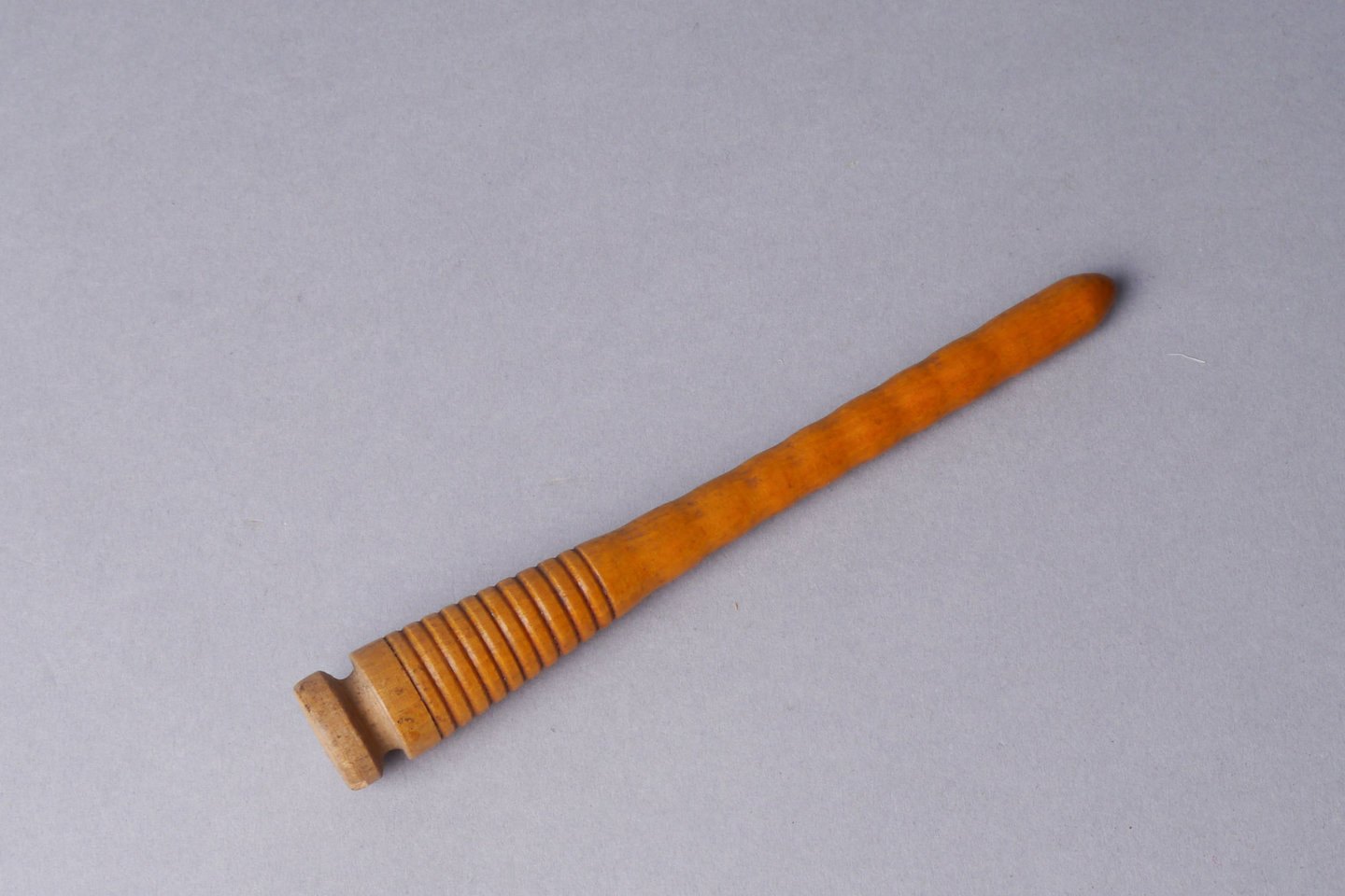 Inslagspoel voor een halfautomatisch weefgetouw