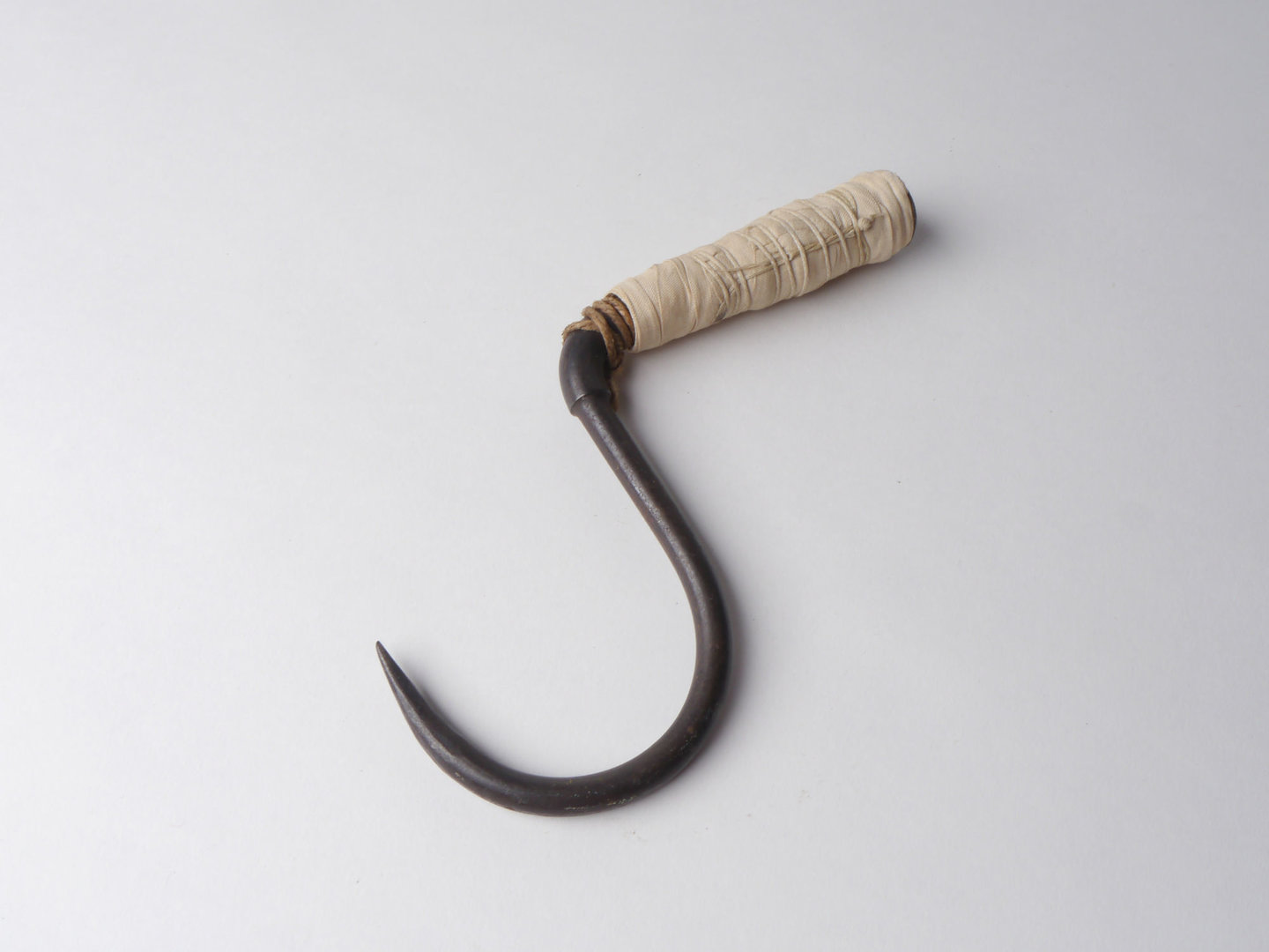 Handhaak voor het aanhaken van balen