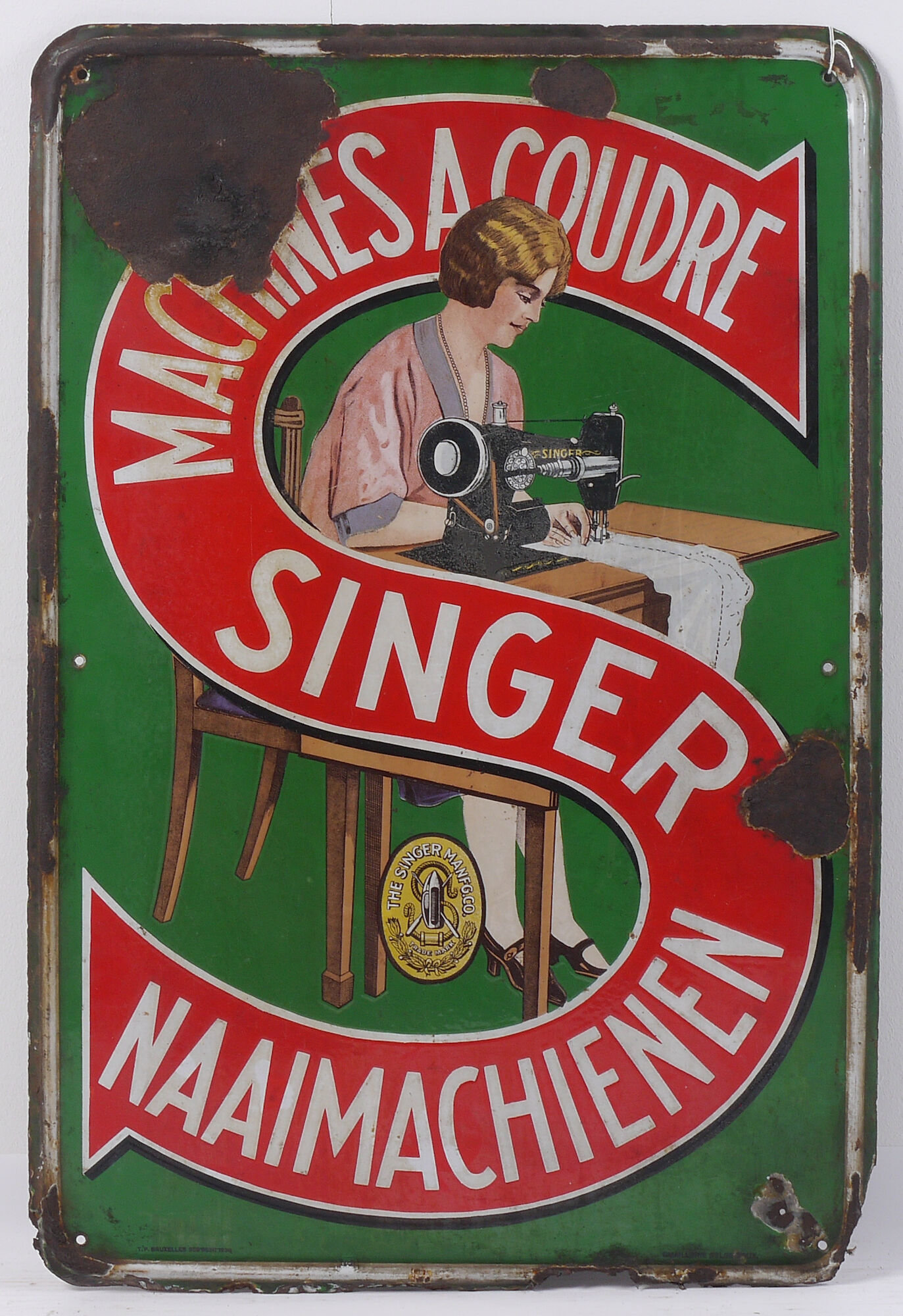 Geëmailleerd reclamebord voor naaimachines van het merk Singer